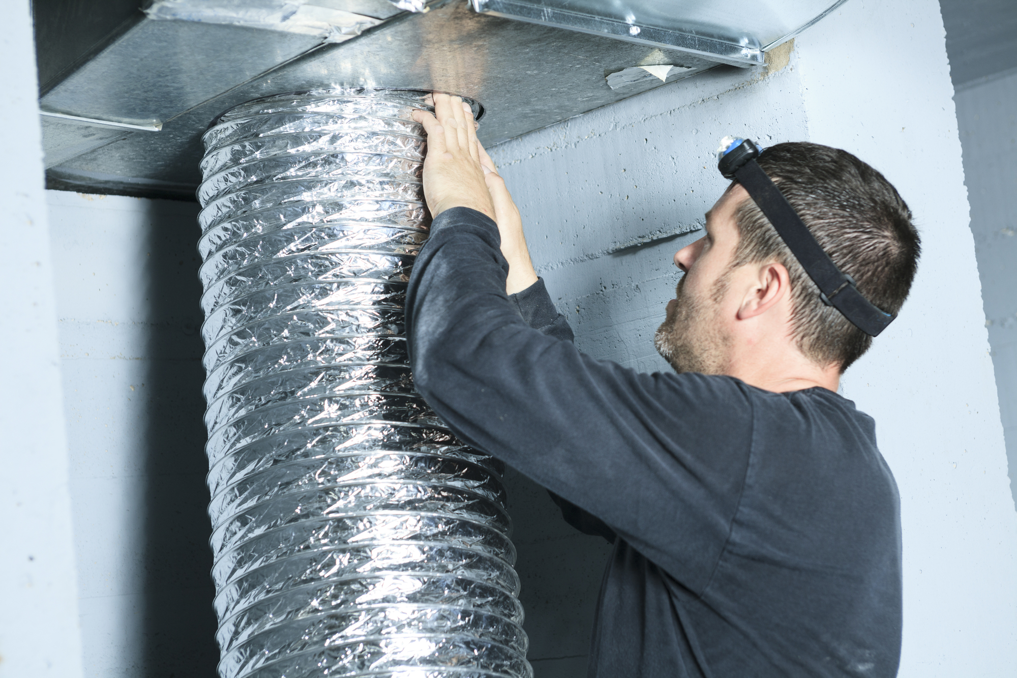 A Ventilation Cleaner Man At Work