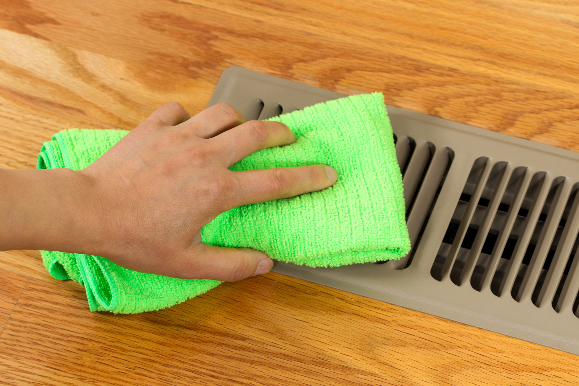 Cleaning Outside Grill Plate Of Heater Floor Vent